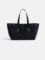 The Perfect Weekend Tote: a large black cotton bag with dual handles, silver rivets on top, and “A R” stitched in front—a stylish monogrammable tote ideal for daily use.