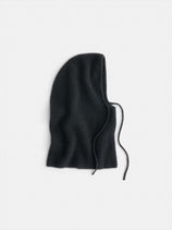 A black Cashmere Balaclava with ribbed knit and two strings, shown flat on a white background.