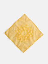 The Two Tone Bandana in Cotton is a vintage Italian bandana, crafted from yellow cotton voile with white paisley and floral patterns, displayed diagonally on a plain white background.