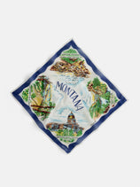 The State Bandana In Cotton Voile is a square scarf with a blue border, vintage bandana style, and Montana landmarks—sailboat, mountains, forests, State Capitol—plus “Montana” at the center.