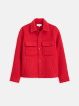 The Work Jacket In Italian Wool features a bright red Casentino wool, collar, button-down front, two chest flap pockets, two side pockets, and long sleeves, shown against a plain white background.