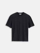 The Crosby Tee in Heavy Slub Cotton features a plain black garment-dyed finish, short sleeves, and a crewneck, displayed on a white background.