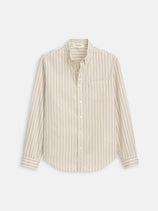 The Mill Striped Shirt In Cotton Poplin features beige and white vertical stripes, a relaxed fit, long sleeves, button-up front, and front pocket. Displayed laid flat against a white background.
