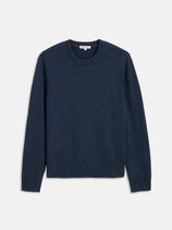 The Reverse Seam Crew In Wool Cotton is a navy blue, long-sleeve crewneck sweater with a cozy knitted texture. Made from a soft wool-cotton blend, this lightweight sweater is shown laid flat on a white background.