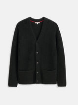 The Jensen Cardigan In Merino is a black, chunky men's cardigan featuring long sleeves, a V-neck, button-down front, and two front pockets, shown against a plain white background.