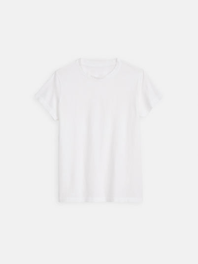 The Prospect Tee In Cotton Jersey, a plain white short-sleeve crew neck made from 100% cotton, is garment-dyed and displayed flat on a white background.
