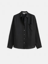 The Jo Pocket Shirt in Silk is a black, long-sleeved women’s blouse with a collar and single chest pocket, made from 100% silk shirt fabric and shown on a plain white background.