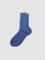 A pair of Maria La Rosa Firefly Lurex Socks in shiny blue lies flat on a light gray background, with one sock slightly overlapping the other.